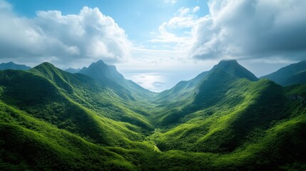 Naklejka premium This breathtaking landscape captures the grandeur of mountains rising over a serene ocean, highlighting nature's magnificence and the sense of tranquility found in untouched wilderness.