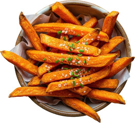 Golden sweet potato fries topped with coarse sea salt and fresh chives in a bowl