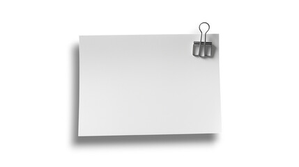 赤いペーパクリップで留められた白い紙片