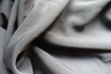 thin simple light gray acrylic fabric in soft folds