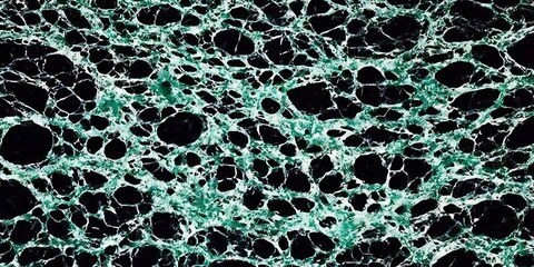 Detailed image of a dark green and black mineral stone pattern