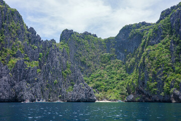 A majestic landscape of natural wonders of limestone cliffs formation in El Nido, Palawan,...