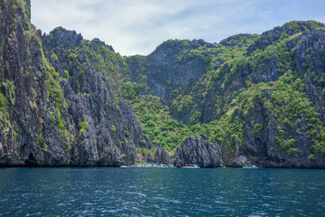 A majestic landscape of natural wonders of limestone cliffs formation in El Nido, Palawan, Philippines. A deep blue ocean and lake is the most famous tourist destination in Asia