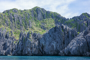 A beautiful landscape of unique limestone cliffs natural formation in El Nido, Palawan,...