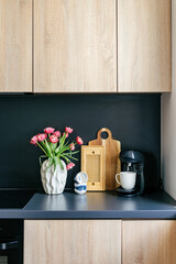 Modern kitchen interior featuring stylish decor and functional furniture