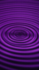 Concentric purple circles emanate from a dark center creating a ripple effect with blurred edges