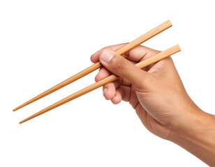 Hand holding chopsticks for Asian cuisine.