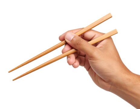 Hand holding chopsticks for Asian cuisine.