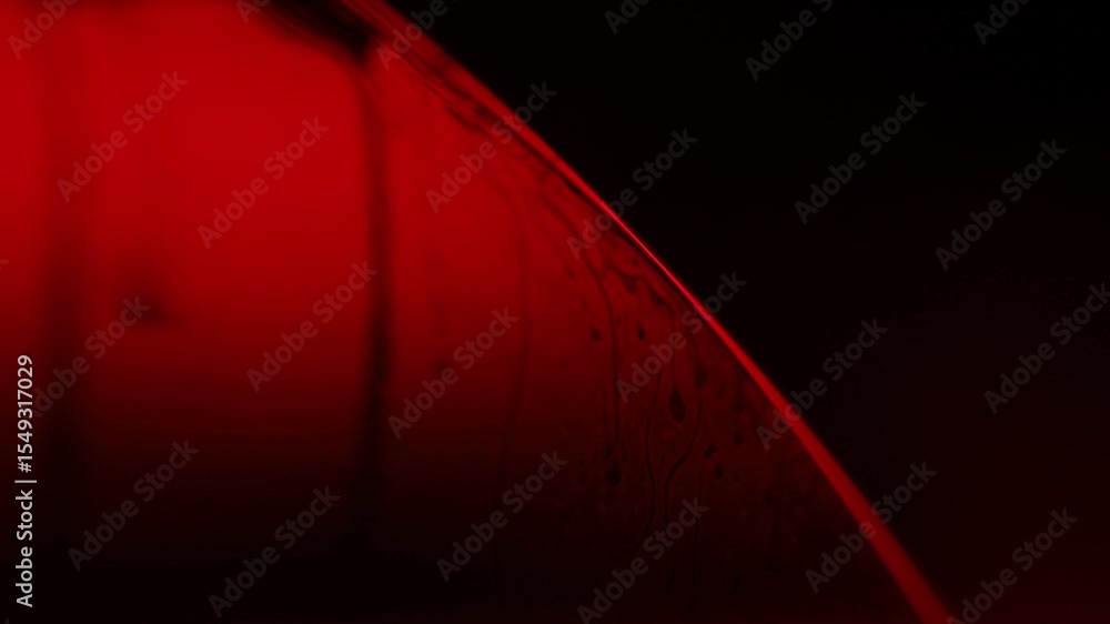 Poster red reflections of liquid in macro, red liquid surface, bubbles in macro, connection of bubbles in m