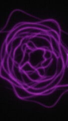 Abstract arrangement of blurred purple lines forming a swirling pattern on a dark black background