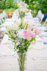 Wedding celebration table set with flowers, copy space background image