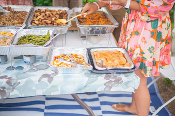 Wedding celebration table set with food, copy  space background image of food set table, celebration, bright summer day