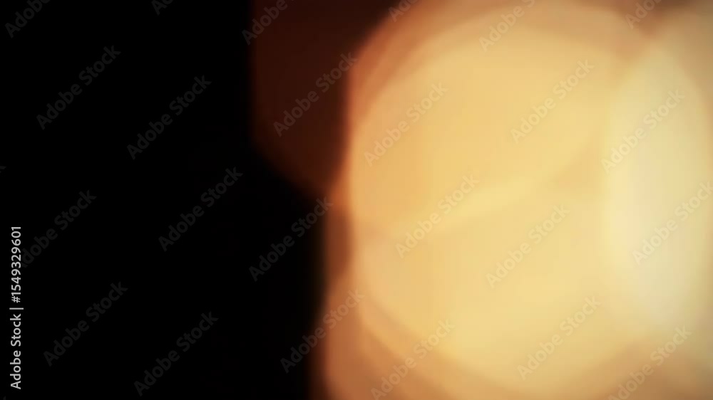 Aufkleber abstract warm golden light bokeh lens effect for modern visual design over dark background. bright s