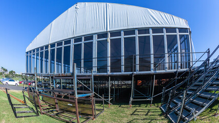 Large portable canvas tent structures with clear plastic perspex walls.