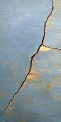 Detailed Image of Cracked Surface with Textured Patterns and Colors
