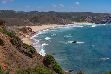 Obraz premium Landscape of the Amado beach since lookout in a sunny day, Carrapateira, Portugal.
