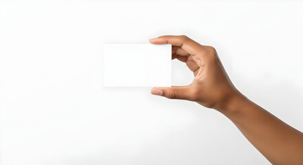 Obraz premium Blank White Card Mockup Hand Holding a Simple, Clean Business Card Template