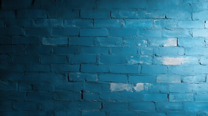 Fototapeta premium This image features a textured blue brick wall, perfect for use as an artistic backdrop in design projects, creating a modern and urban aesthetic with cool tones.