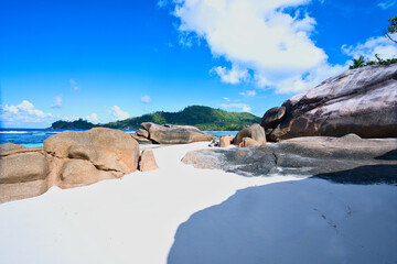 empty and scenic beautiful beach of baie lazare, white sandy beaches with huge stones, Mahe...