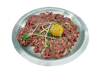 Korean fresh raw beef tartare (Yukhoe) with egg yolk and sesame
