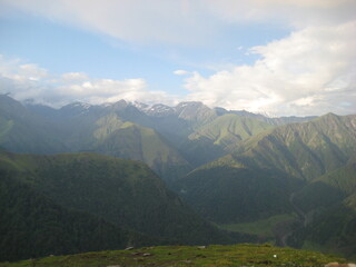 Naklejka premium mountain landscape with clouds