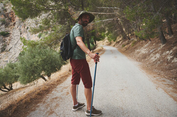 Backpacker Exploring Scenic Mountain Trail During a Peaceful Hiking Adventure