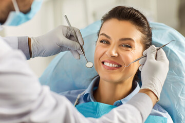 Dentist exam, teeth, gums, dental care exam, happy smiling woman healthy smile at doctor visit in clinic, demonstrating whitening teeth procedure result, satisfied with stomatology clinic service