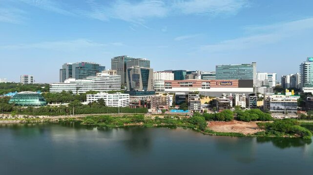 Hyderabad, India: Aerial view of modern office buildings skyline in capital and largest city of Indian state of Telangana - landscape panorama of South Asia from above
