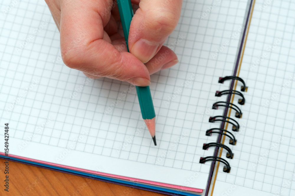 Poster creating art on a blank page with inspiration and focus