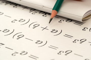 Solving mathematical equations in a cozy study environment