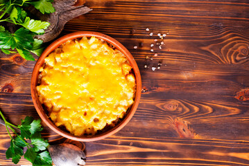 Potato gratin - graten (baked potatoes with cream and cheese) .
