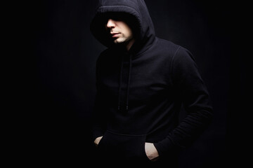 Person in Hood. Man or Boy in a hooded sweatshirt