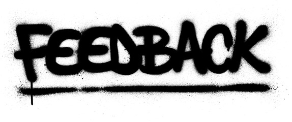 Graffiti feedback text sprayed in black over white