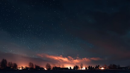 the sky is dark and the stars are shining brightly .