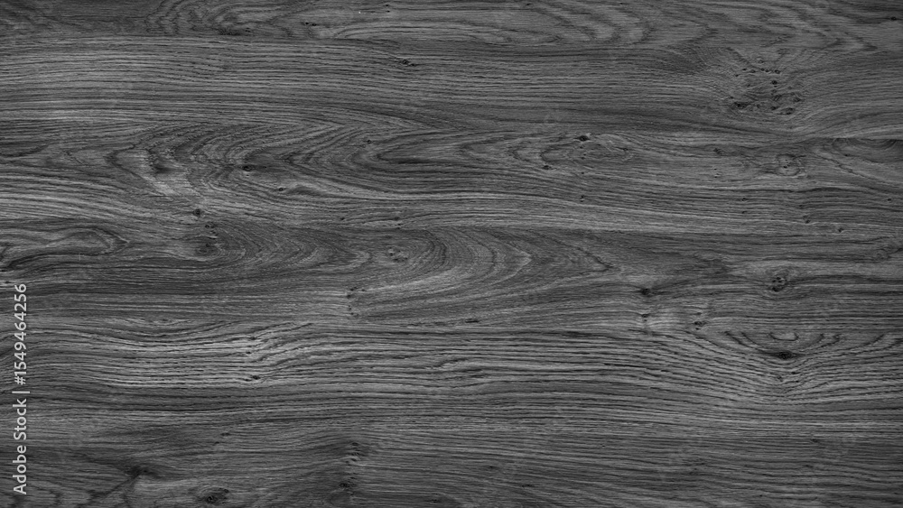 Poster a wooden surface with a grainy texture. the wood is dark and has a natural look. the surface is smoo