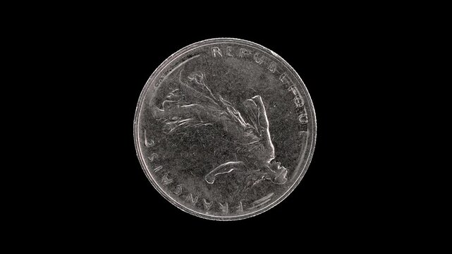 France 1960 1 franc coin obverse with the Sower by Oscar Roty rotating on black background