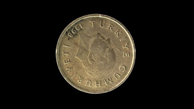 Turkey 1998 50 000 lira coin obverse with Atat&uuml;rk portrait rotating on black background