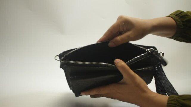 hand woman holding suitcase