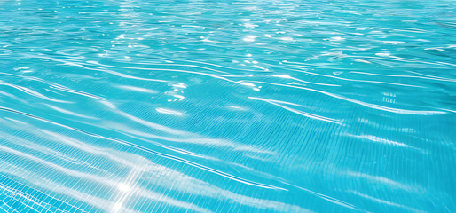 Clear turquoise water surface with sun reflections – tropical sea background