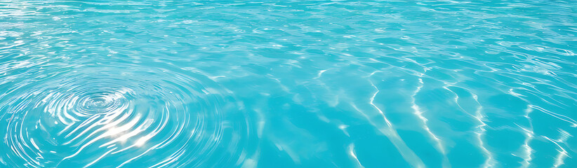 Clear turquoise water surface with sun reflections – tropical sea background