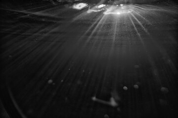 underwater dark background, deep black water, gloomy deep waters abstract underwater backdrop