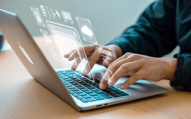 Digital Interface: A close-up view of a person engrossed in work on a laptop, their hands swiftly navigating the keyboard.