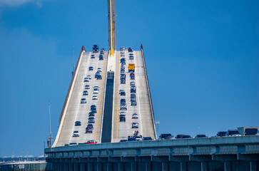 Sunshine Skyway Bridge, officially known as the Bob Graham Sunshine Skyway Bridge, spans Tampa Bay in Florida, connecting St. Petersburg to Terra Ceia in Florida USA