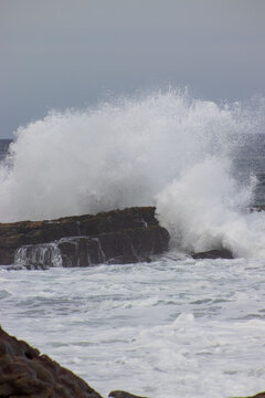 wave breaking on the rocks