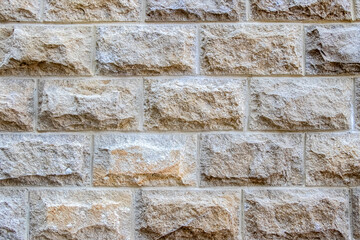 Modern brick wall texture natural stone close-up, architectural backgrounds, interior design,...