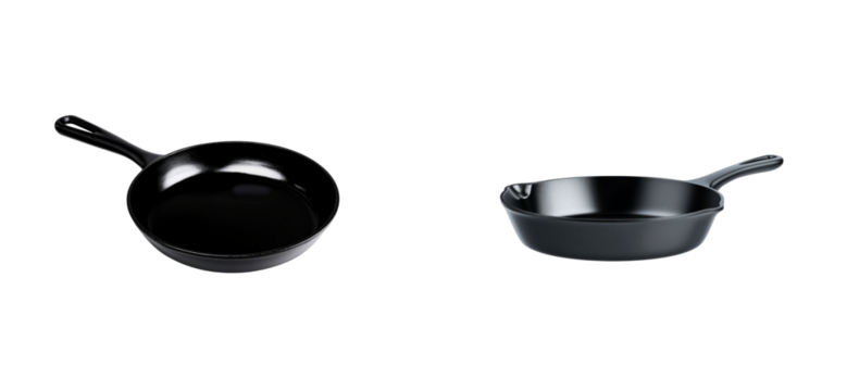 Two cast iron frying pans isolated on black, cut out transparent