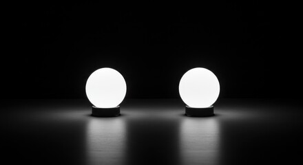 Two glowing white spheres on a dark surface, creating a minimalist aesthetic