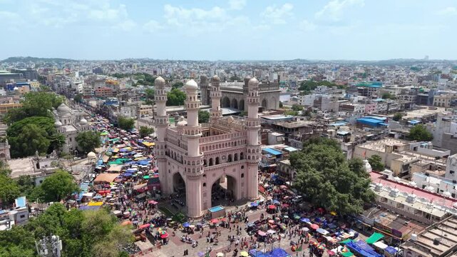Hyderabad, India: Aerial view of Charminar, iconic monument and symbol of capital and largest city of Indian state of Telangana - landscape panorama of South Asia from above
