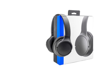 black acoustic stereo headphones on white background and cardboard box