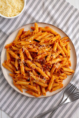 Homemade Pasta Bolognese with Cheese on a Plate, top view.